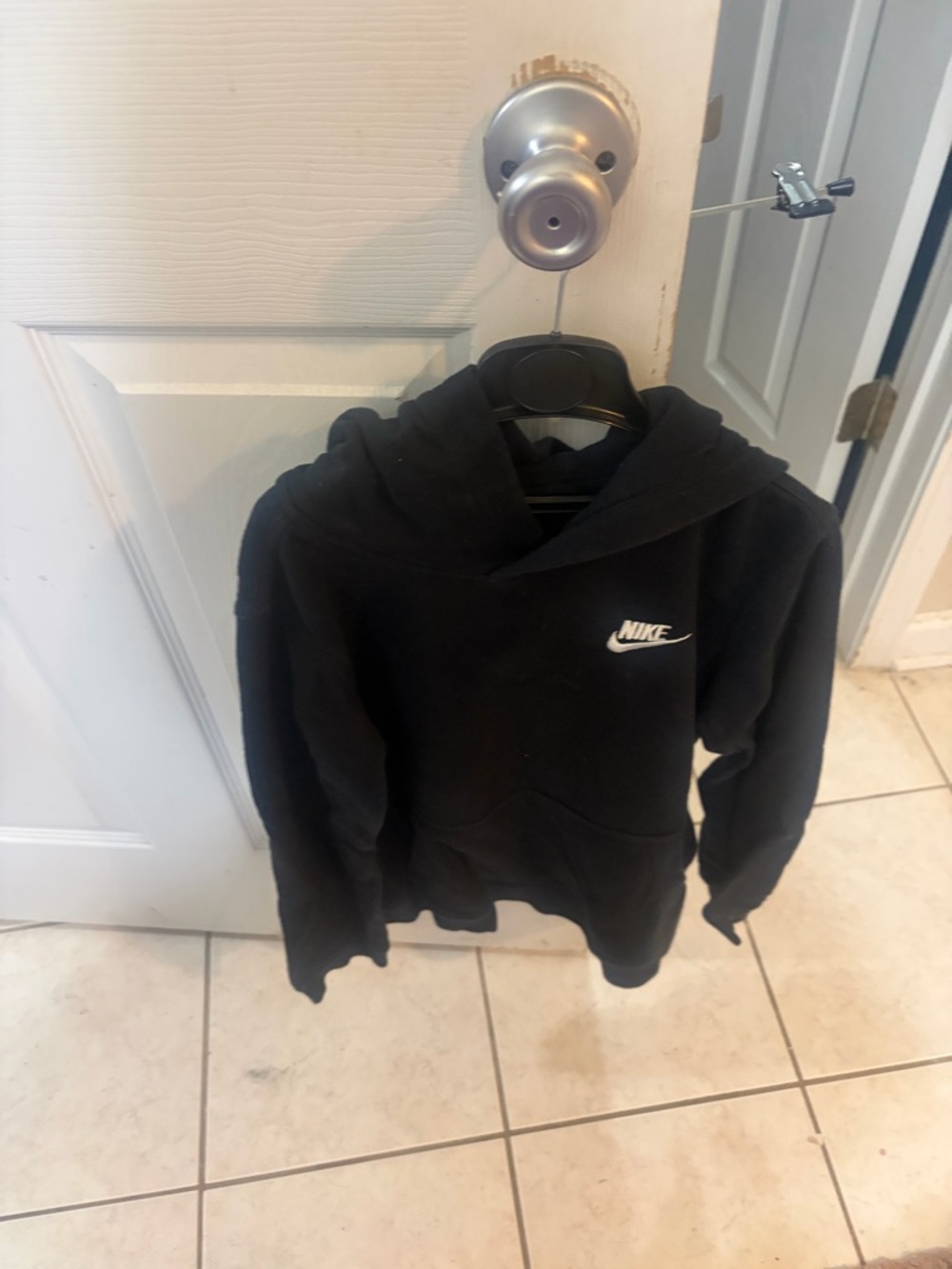 Nike Black Hoodie with White Swoosh Logo
